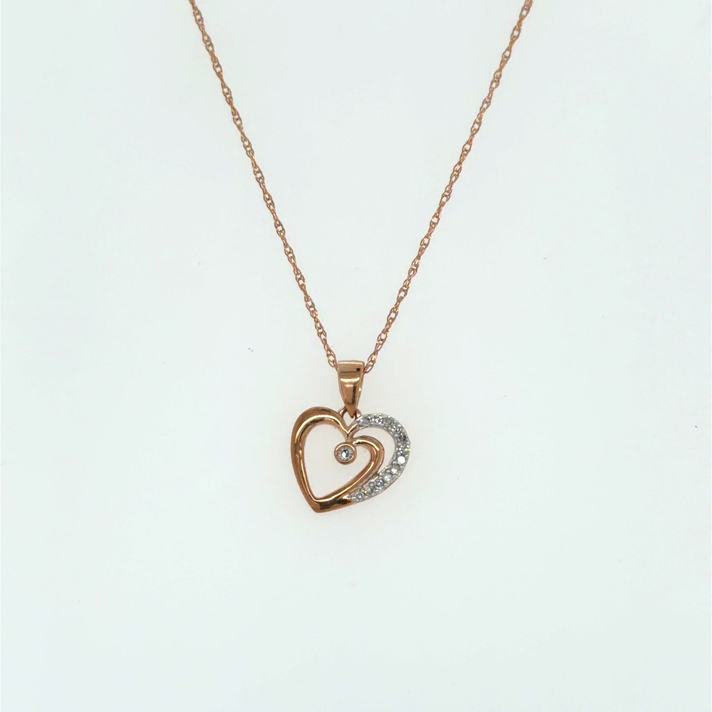 0.06 CTW Diamond Heart Pendant in 10K Rose Gold