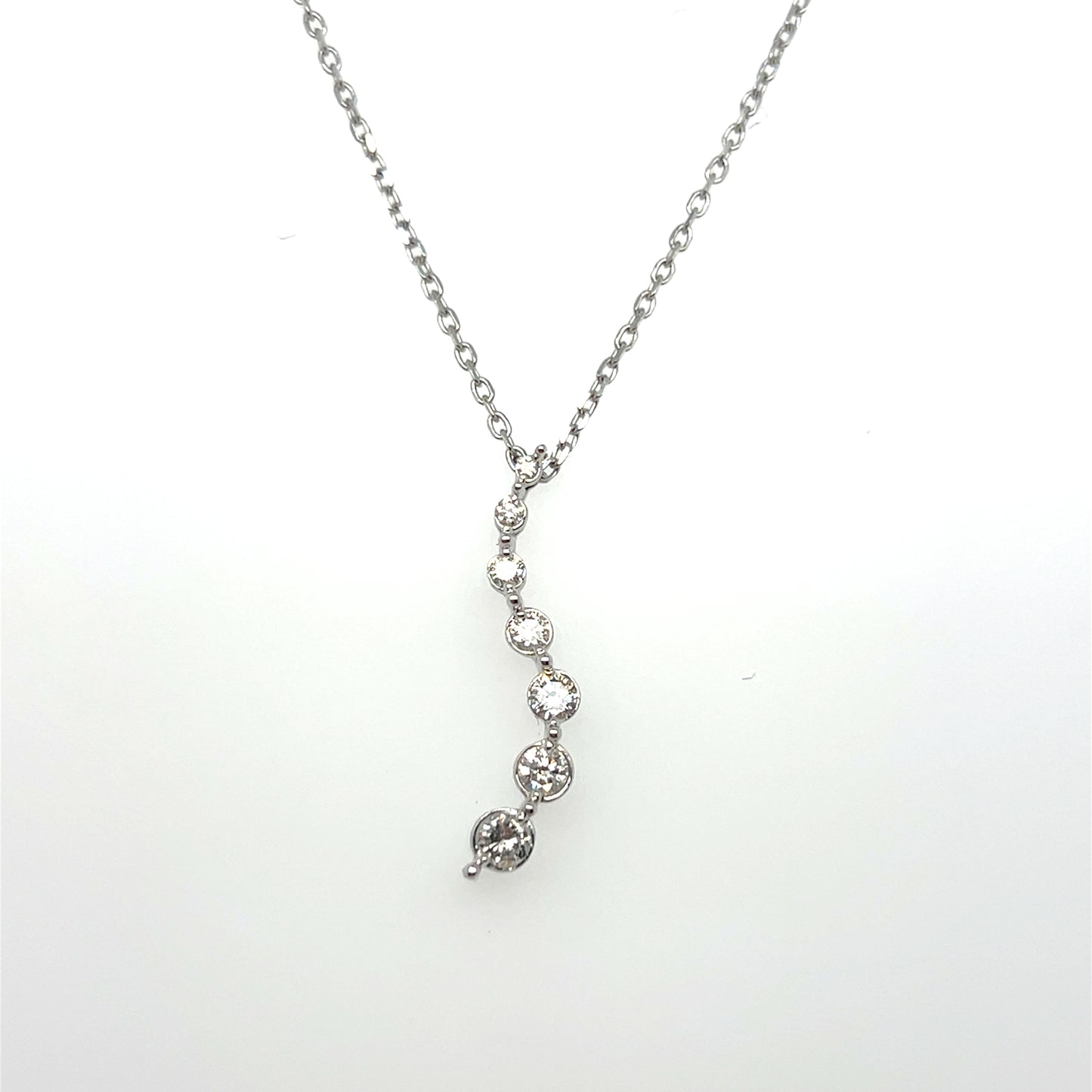 0.25CTW Diamond Journey Pendant in 10K White Gold