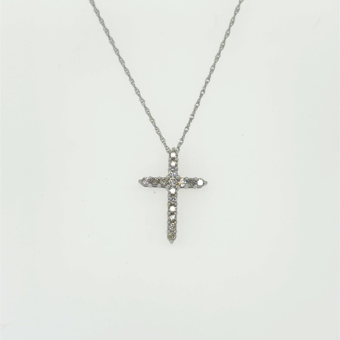 0.25 CTW Diamond Cross Pendant in 10K White Gold