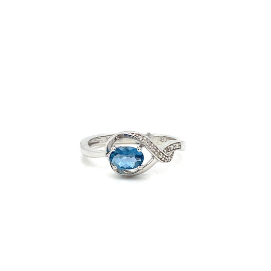 .02ctw Diamond and London Blue Topaz 10kt White Gold Ring