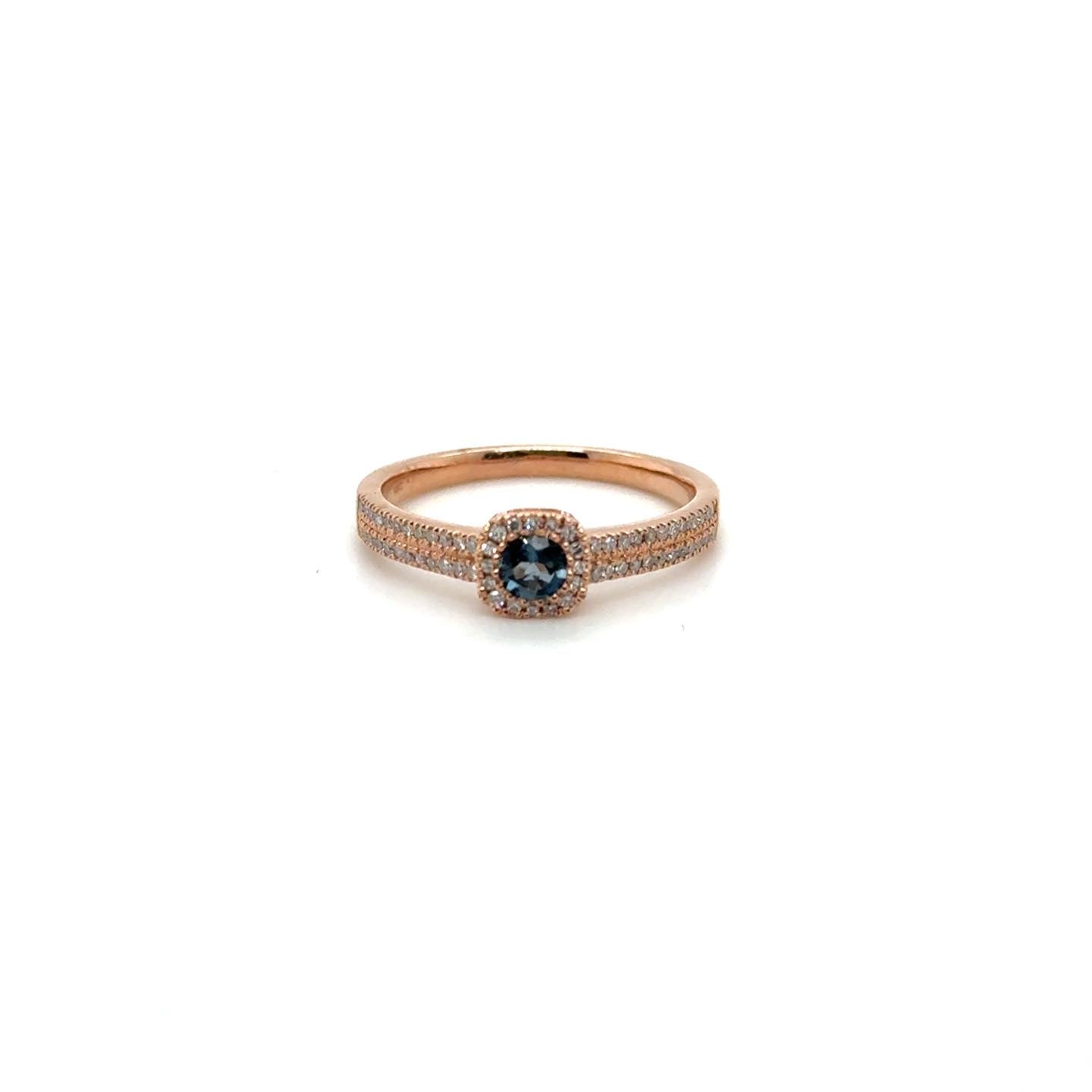 .14ctw Diamond and .20ct London Blue Topaz 10kt Rose Gold Ring