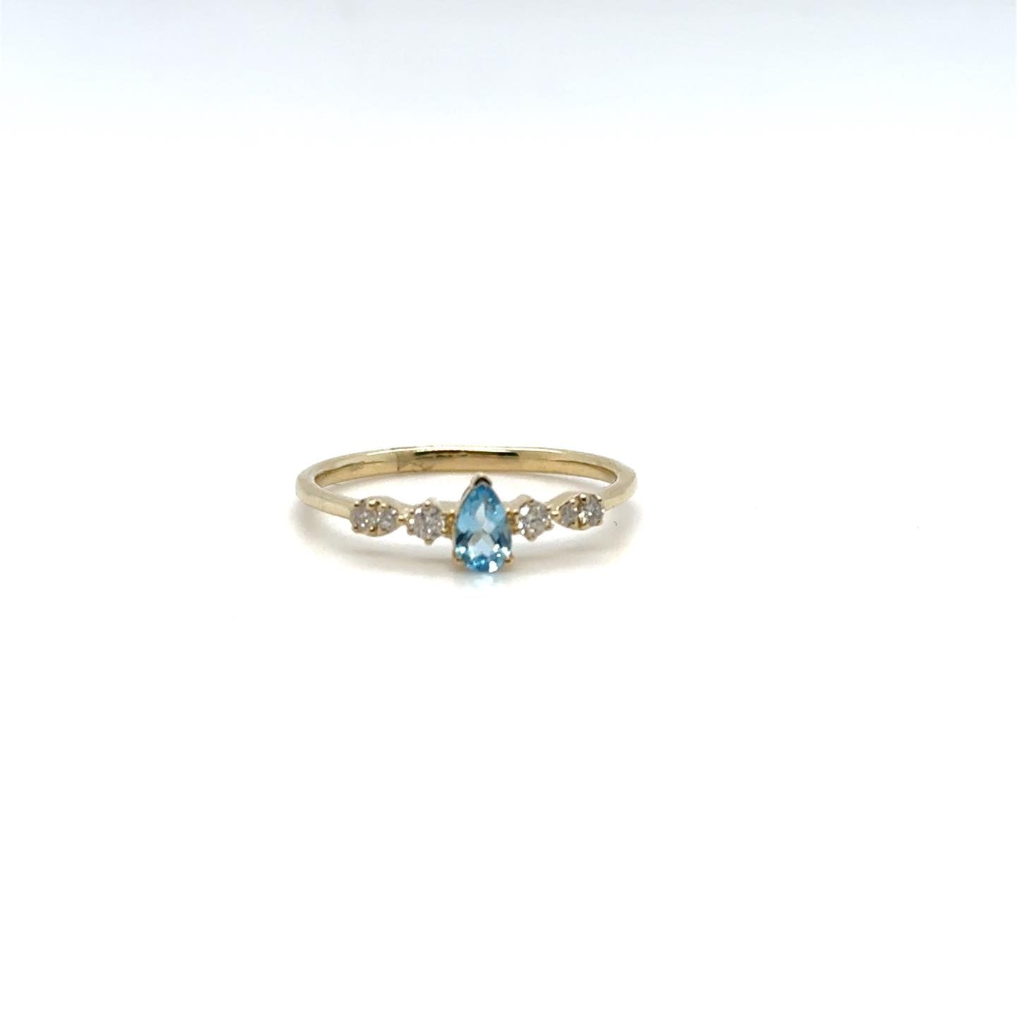 .11ctw Diamond and Blue Topaz 10kt Yellow Gold Ring
