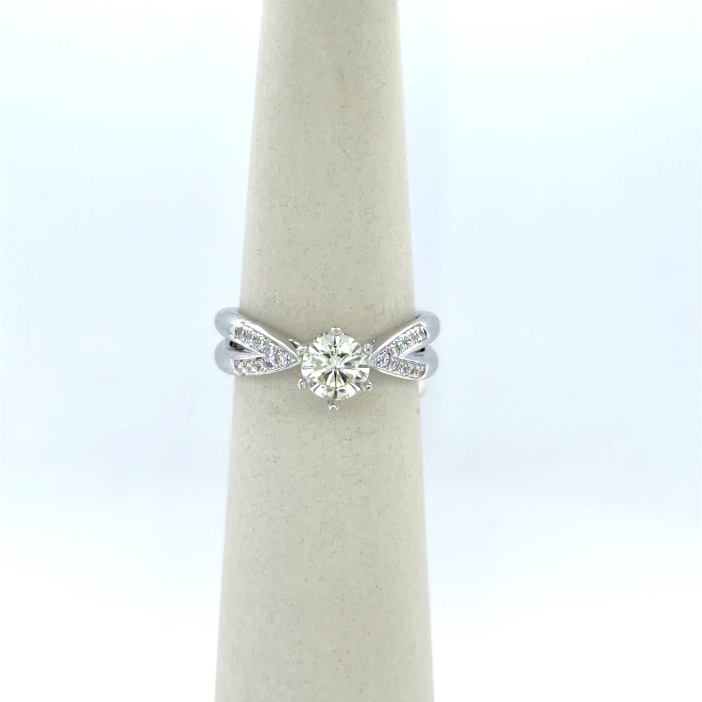 0.72 CT Round Diamond Criss-Cross Side-Stone Engagement Ring in 14K White Gold
