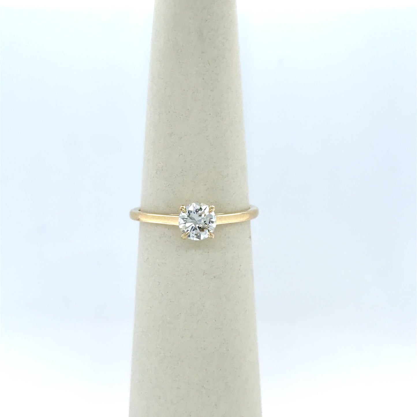 0.57 CT Round Diamond Solitaire Engagement Ring in Yellow Gold