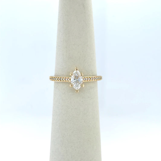0.7 CT Marquise Diamond Side-Stone Engagement Ring in 14K Yellow Gold