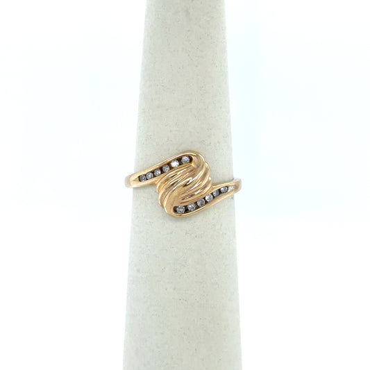 0.08 CTW Diamond Swirl Cluster Ring in 10K Yellow Gold