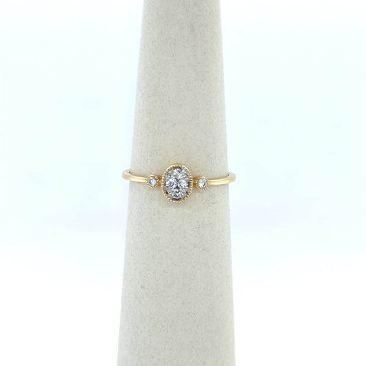 0.16 CTW Oval Diamond Cluster Ring in 14K Yellow Gold
