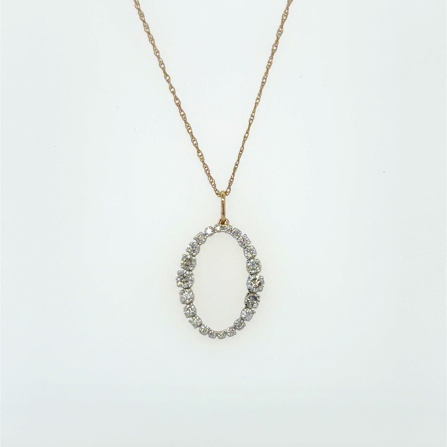 0.5 CTW Oval Diamond Pendant in 14K Yellow Gold