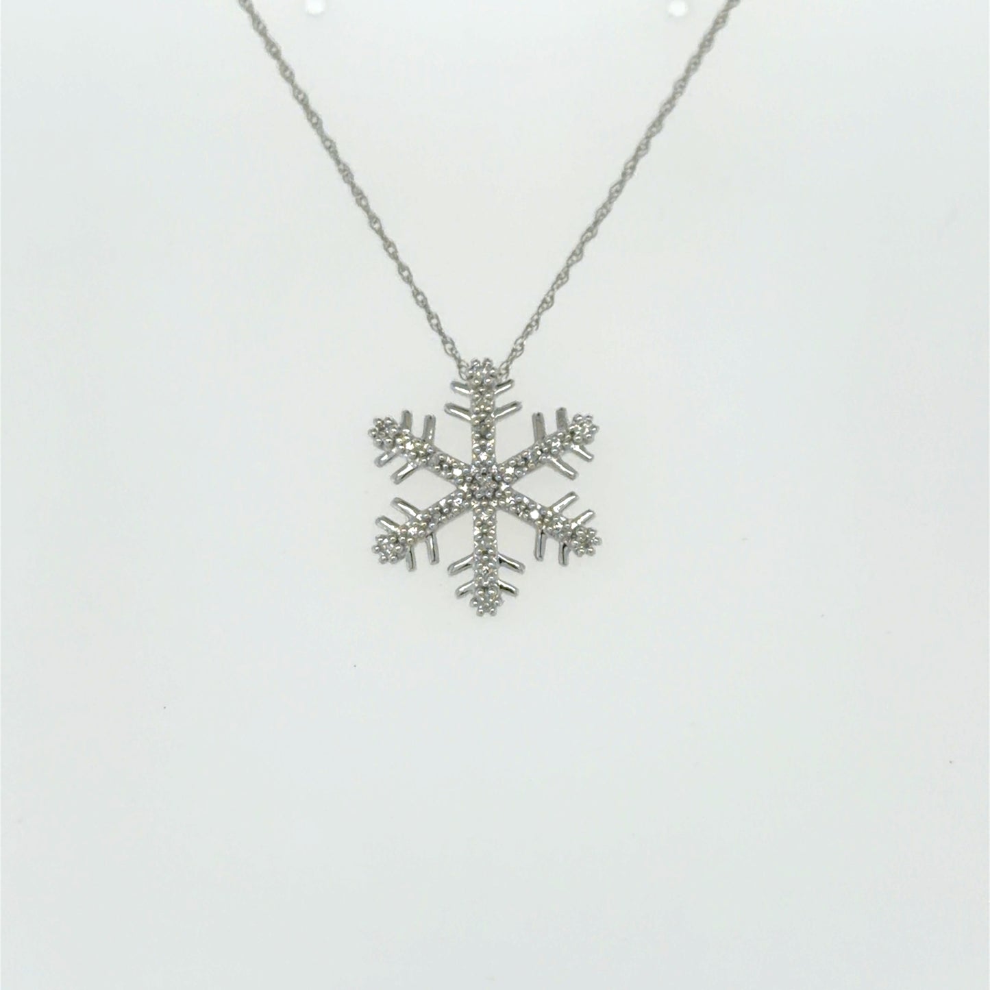 0.1 CTW Diamond Snowflake Pendant in 10K White Gold