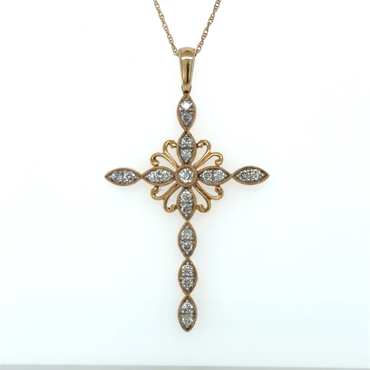 0.5 CTW Diamond Cross Pendant in 10K Yellow Gold