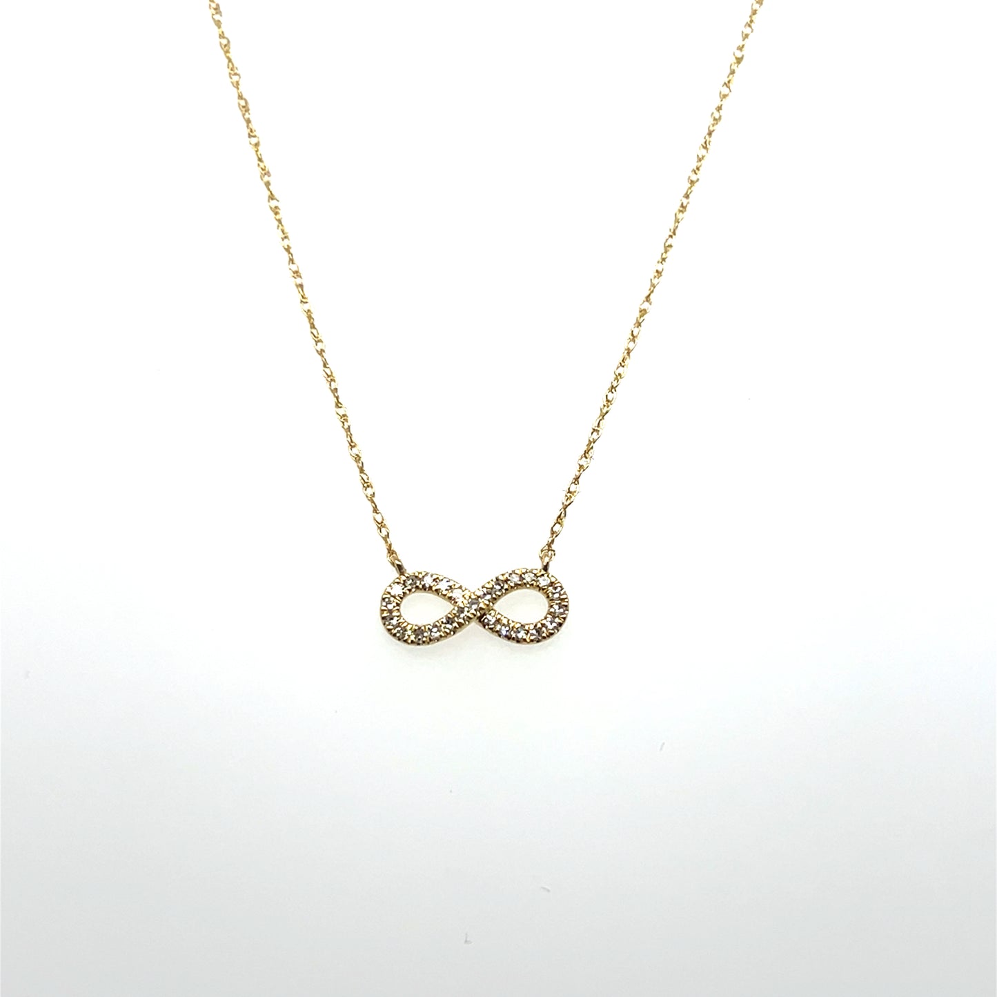 0.10CTW Diamond Infinity Pendant in 10K Yellow Gold