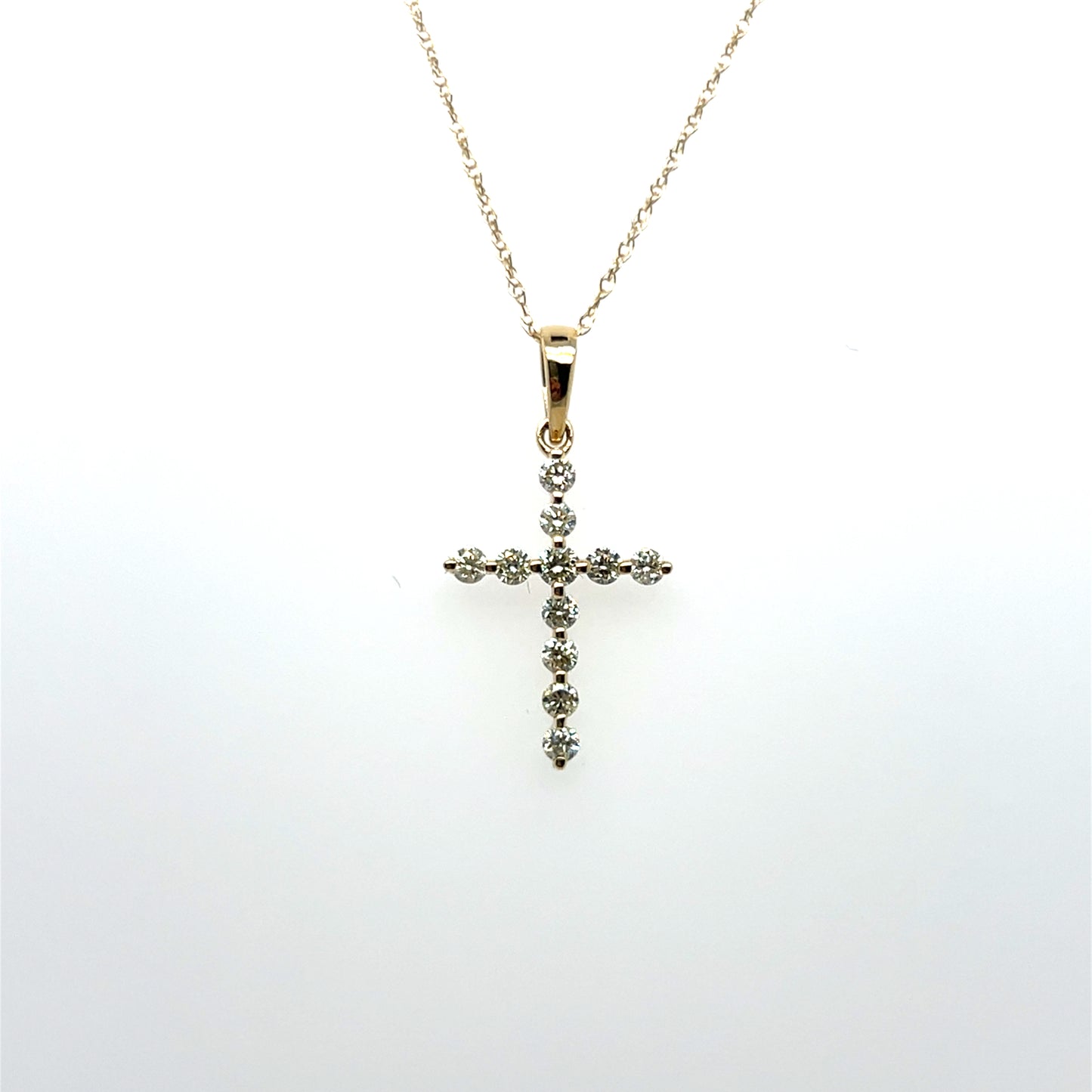 0.25CTW Diamond Cross Pendant in 14K Yellow Gold