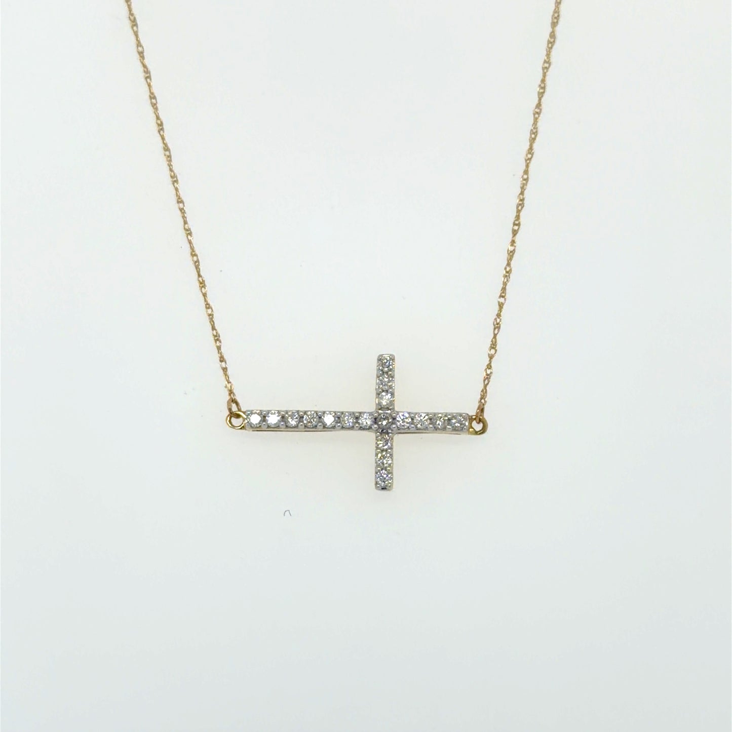 0.2 CTW Sideways Diamond Cross Pendant in 10K Yellow Gold