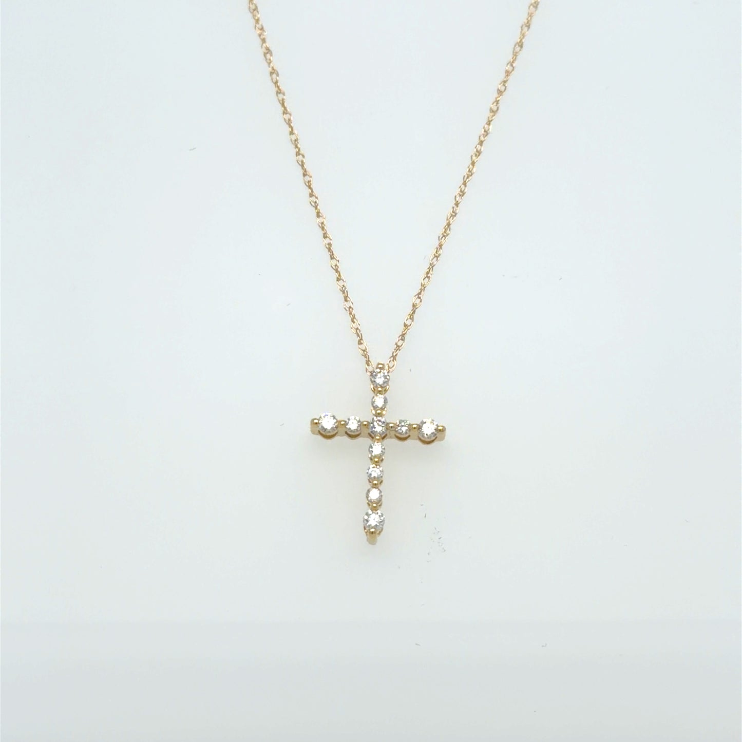 0.16 CT Natural Diamond Cross Pendant in 10K Yellow Gold