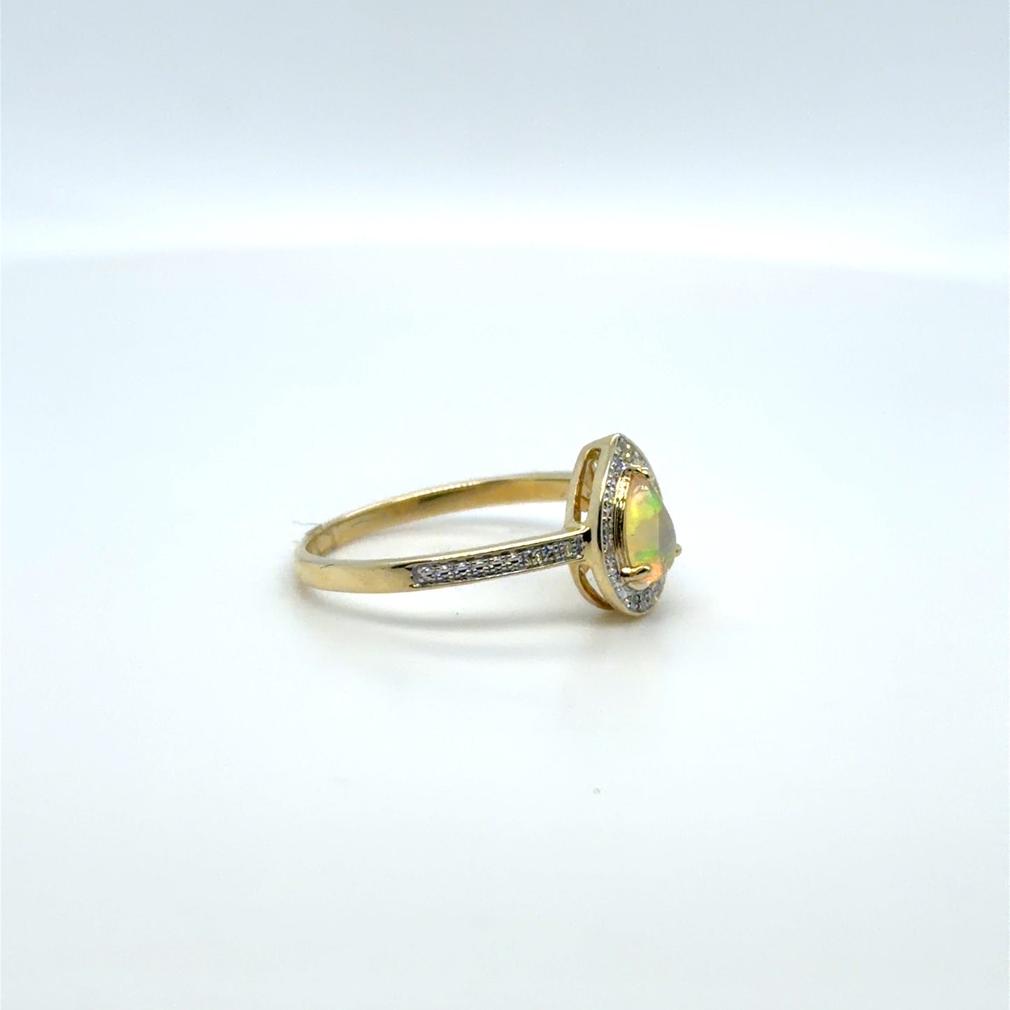 0.25 CT Opal & Natural Diamond Pear Halo Ring in 10K Yellow Gold