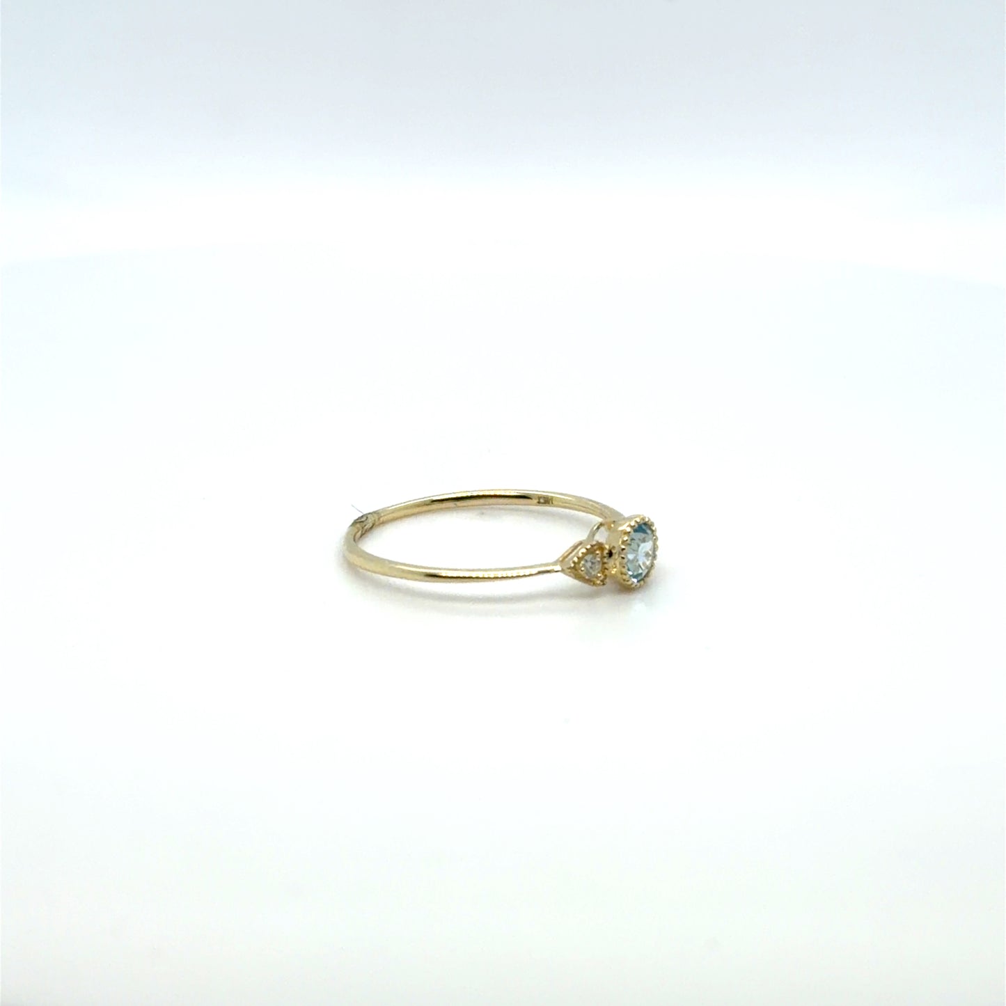 0.30 CT Swiss Blue Topaz & Natural Diamond Simple Ring in 10K Yellow Gold