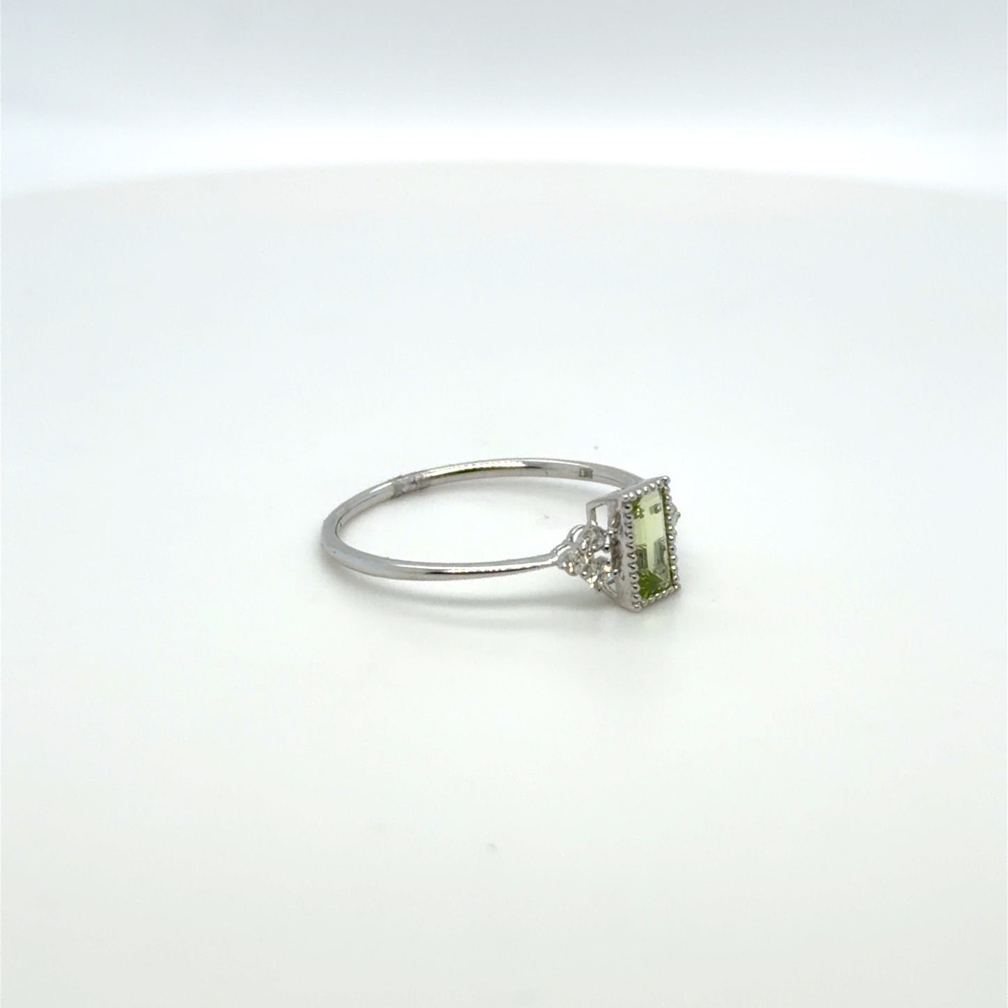 0.44 CTW Peridot & Natural Diamond Accented Ring in 10K White Gold