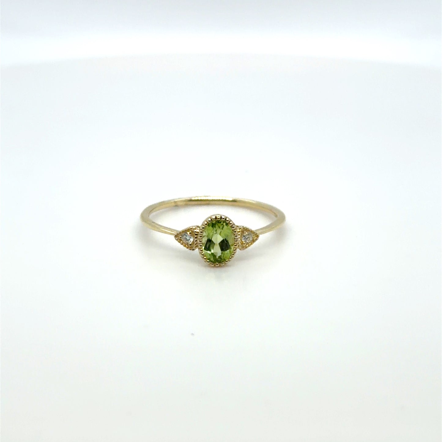 0.54 CT Peridot & Natural Diamond Accented Oval Ring in 10K Yellow Gold