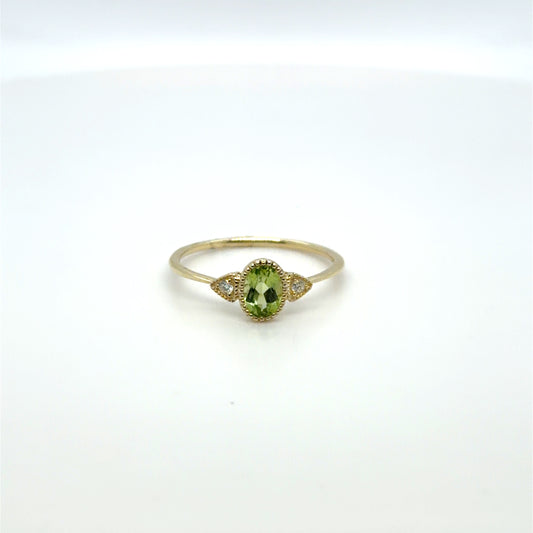 0.54 CT Peridot & Natural Diamond Accented Oval Ring in 10K Yellow Gold