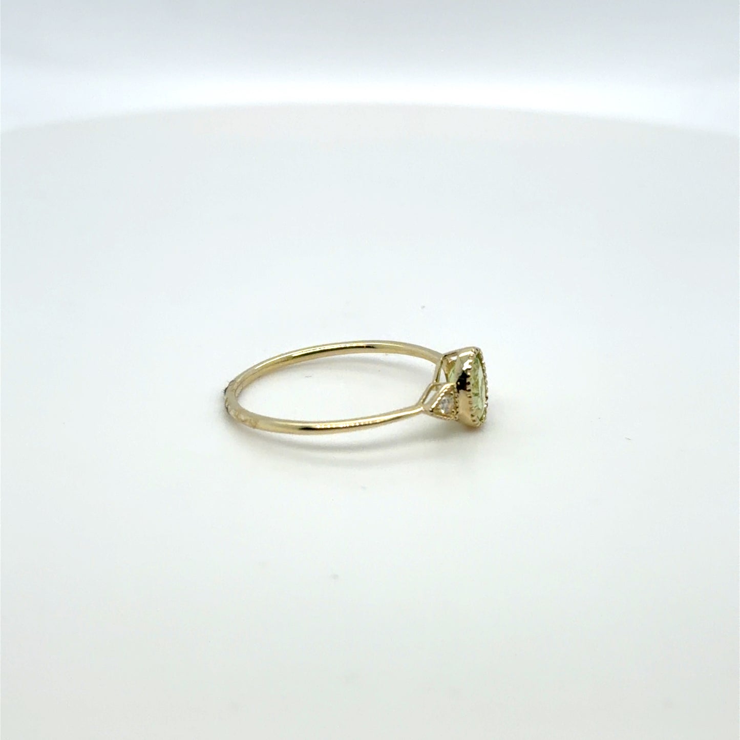 0.54 CT Peridot & Natural Diamond Accented Oval Ring in 10K Yellow Gold