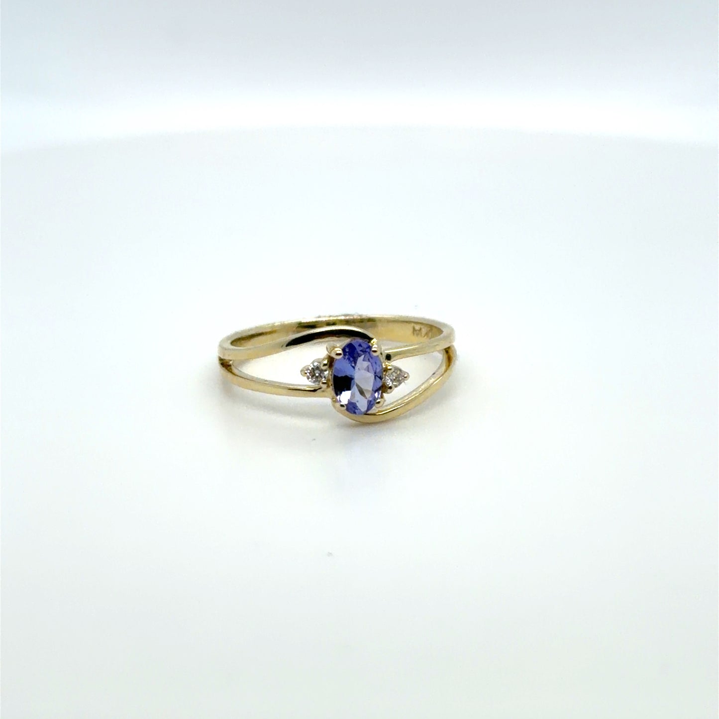 0.50 CTW Tanzanite & Natural Diamond Bypass Ring in 10K Yellow Gold