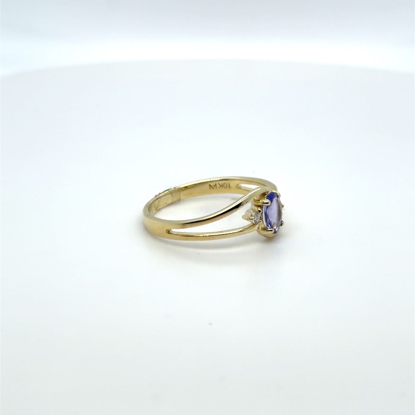 0.50 CTW Tanzanite & Natural Diamond Bypass Ring in 10K Yellow Gold