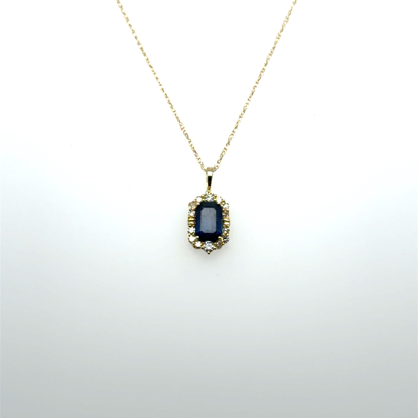 0.70 CT Sapphire & Natural Diamond Halo Pendant in 14K Yellow Gold