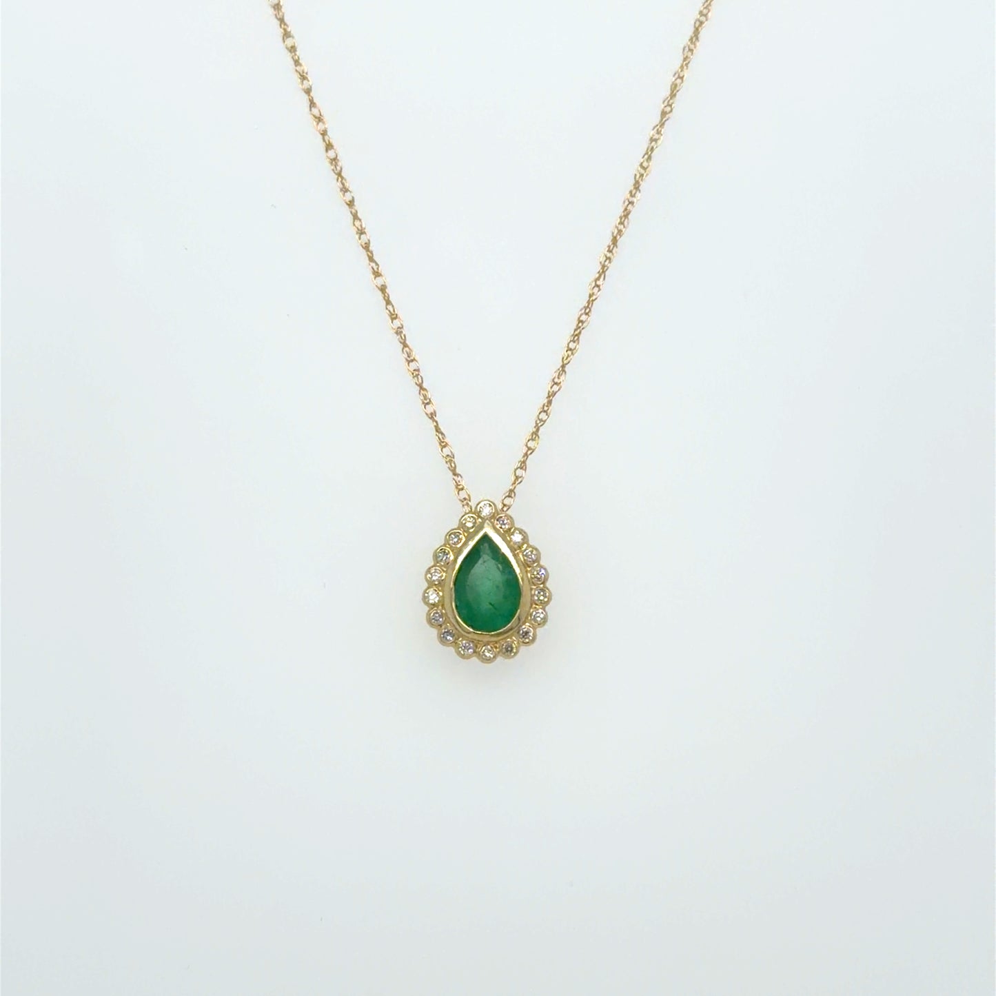 0.40 CT Emerald & Natural Diamond Halo Pendant in 14K Yellow Gold