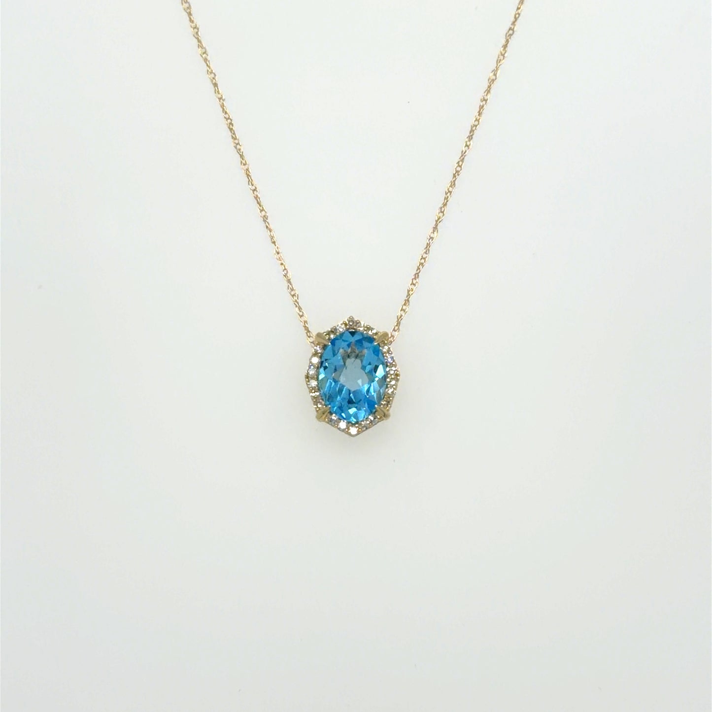 1.50 CT Blue Topaz & Natural Diamond Halo Pendant in 10K Yellow Gold