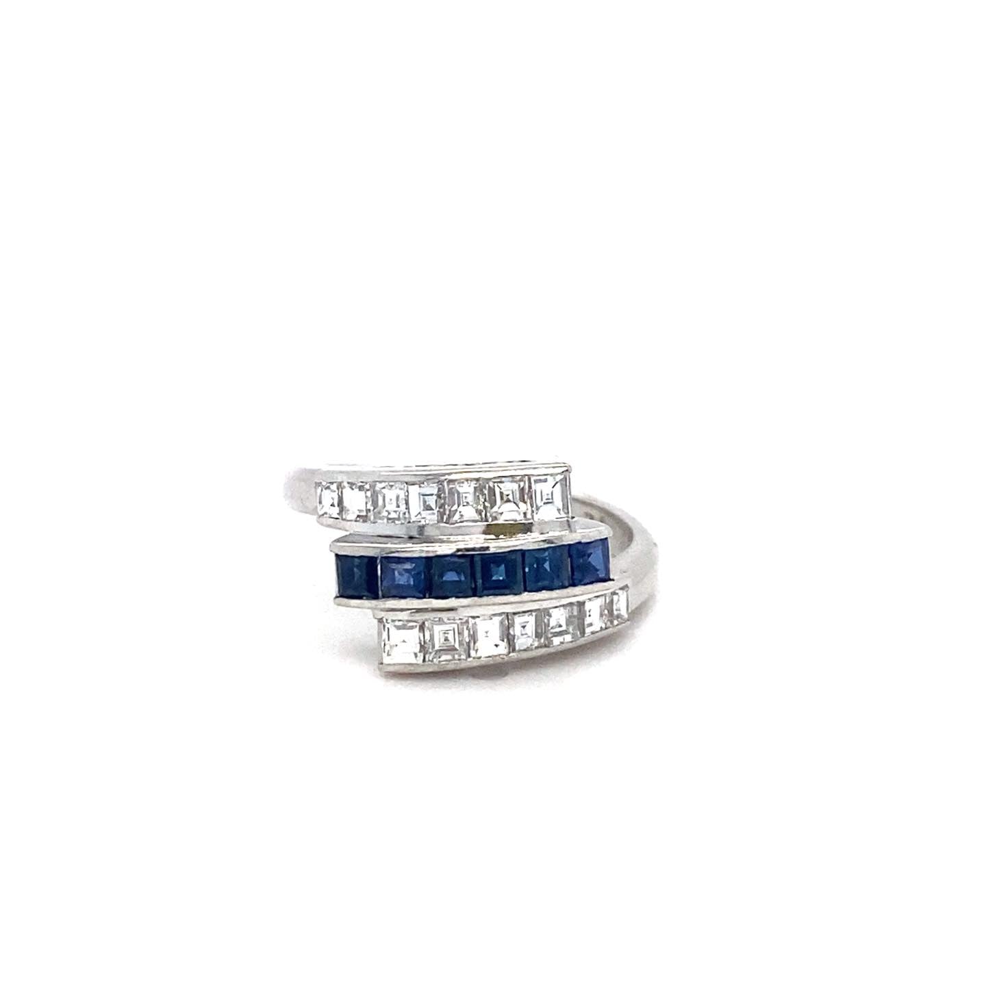 .72ctw Diamond and .56ct Sapphire Platinum Ring