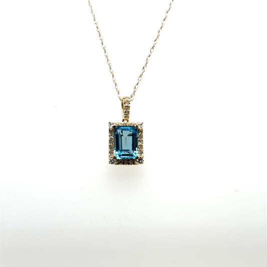 .14ctw Diamond and Swiss Blue Topaz 10kt Yellow Gold Pendant with Chain