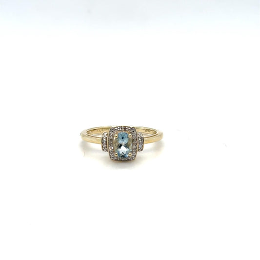 Aqua Marine and .05ctw Diamond 10kt Yellow Gold Ring