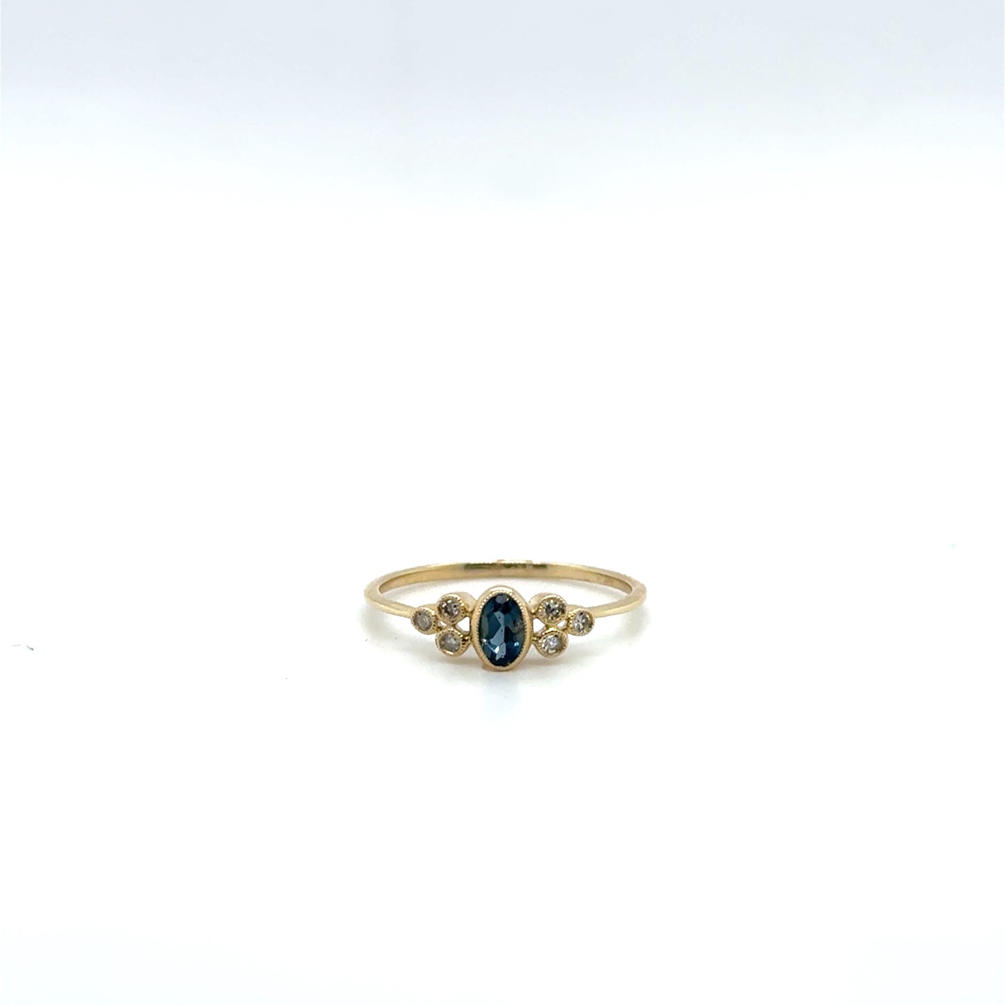 .28ctw London Blue Topaz and .07ctw Diamond Yellow Gold Ring