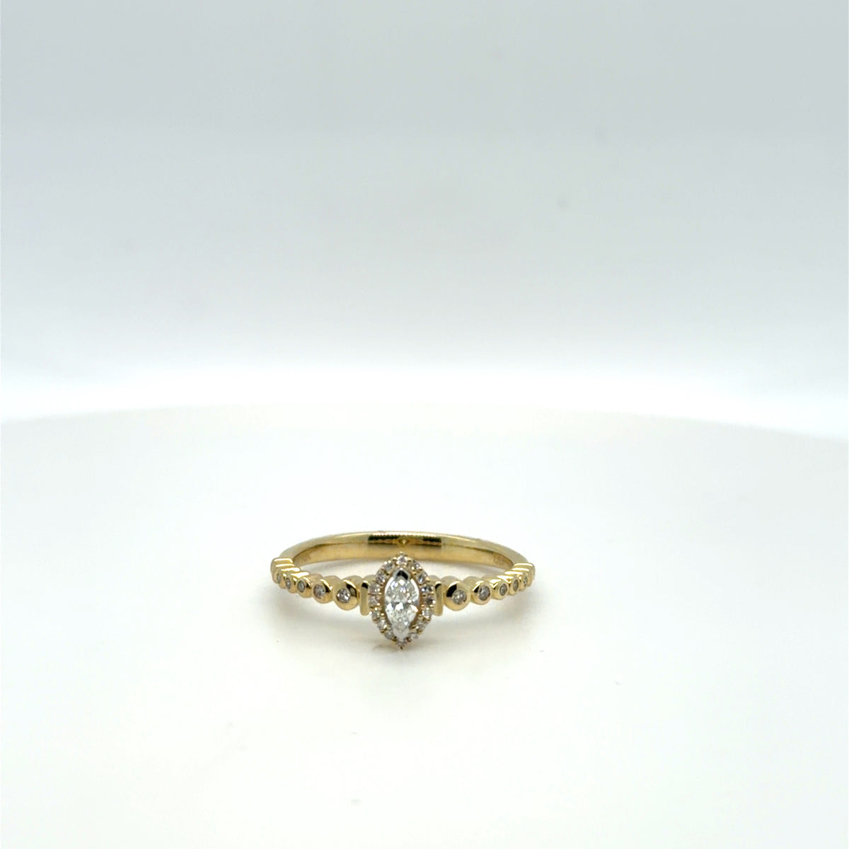 1/5 CTW Marquise Diamond Halo Pendant in 10K Yellow Gold